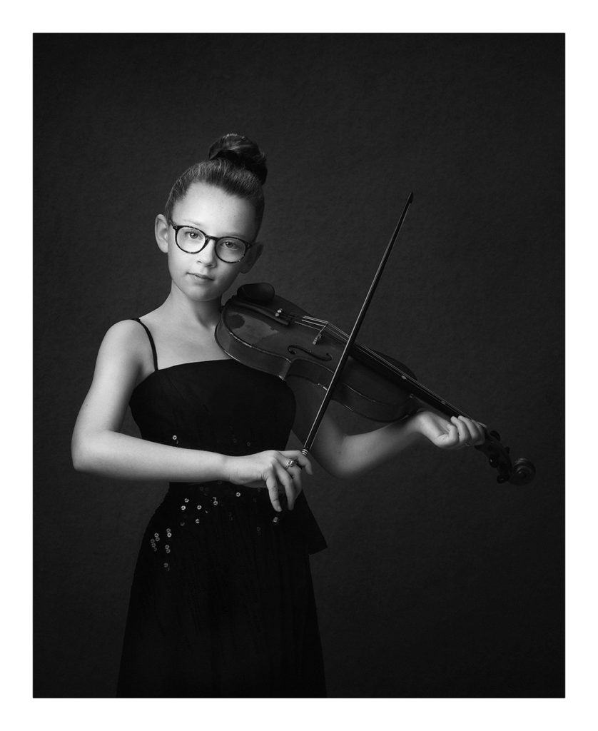 portrait of a girl playing the violin